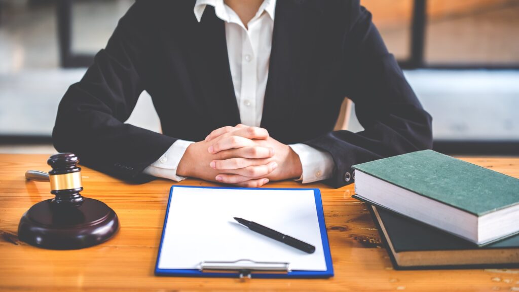 judge with hammer lawyer justice a businessman in a suit or a lawyer working on paperwork Legal conc